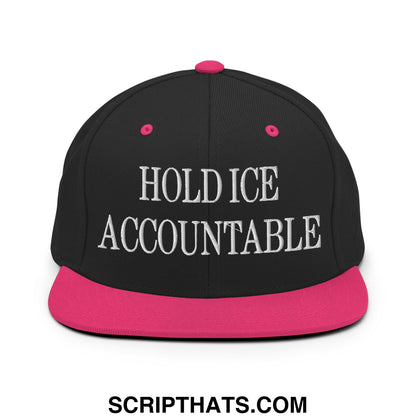 Black snapback hat with vibrant pink brim and button embroidered with hold ice accountable in white letters