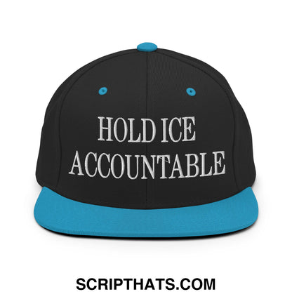 Black snapback cap with teal brim and button featuring white embroidered hold ice accountable text on front