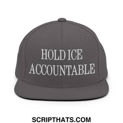 Gray snapback hat with white embroidered hold ice accountable text and flat bill brim for casual wear