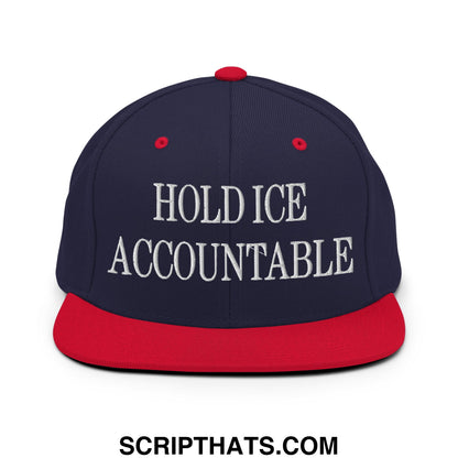 Navy blue and red snapback hat with white embroidered hold ice accountable text and flat bill brim design