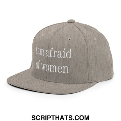 Gray snapback hat with white embroidered text reading i am afraid of women flat bill brim design