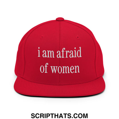 Red snapback hat with white embroidered text reading i am afraid of women flat bill brim design