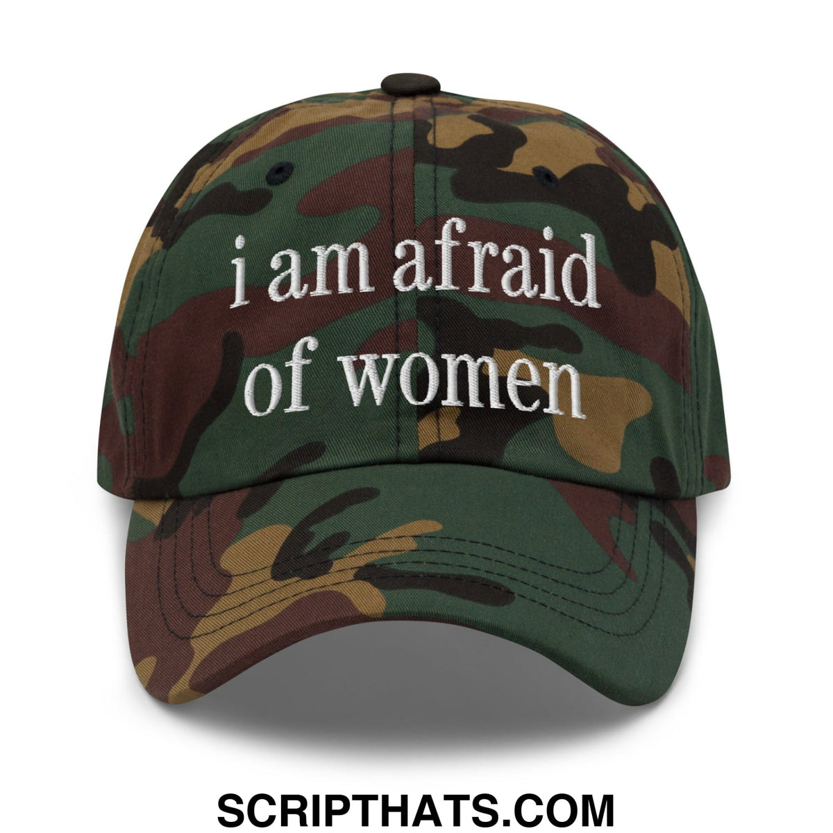 A camouflage-patterned embroidered unstructured dad hat with white text reading i am afraid of women