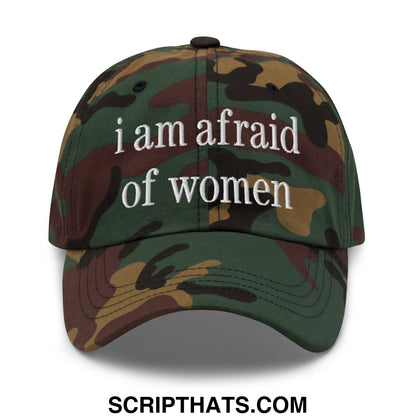 A camouflage-patterned embroidered unstructured dad hat with white text reading i am afraid of women