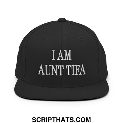 Black flat bill snapback hat with white embroidered i am aunt tifa text ideal for casual wear