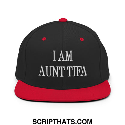 Black snapback hat with red brim and white embroidered text i am aunt tifa on front flat bill brim design