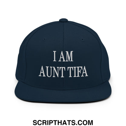 Navy blue snapback hat with white embroidered i am aunt tifa text and flat bill brim design