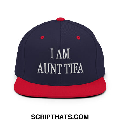 Navy blue snapback hat with red brim and white embroidered text i am aunt tifa on front panel flat bill design