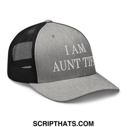 Gray and black embroidered mesh trucker hat with white text reading i am aunt tie for casual wear