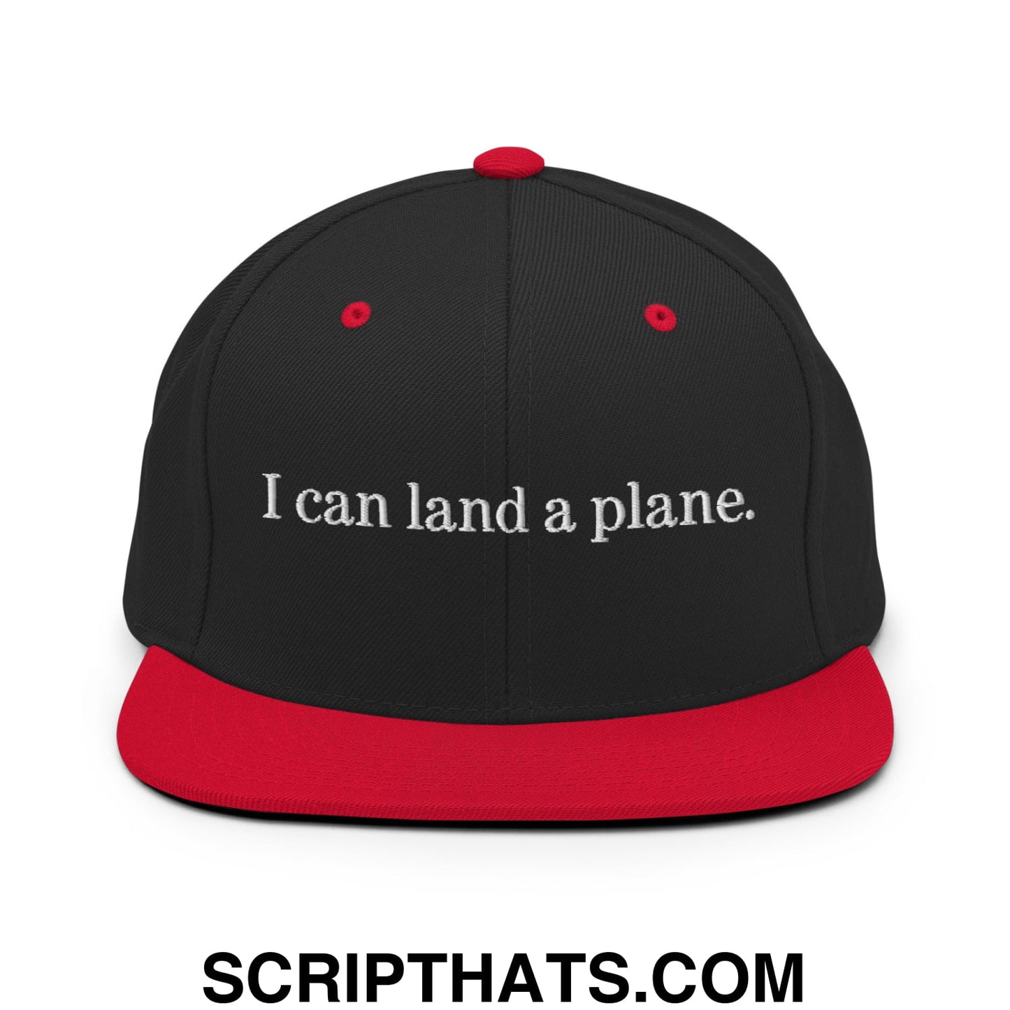Black snapback cap with red brim and button featuring white embroidered text i can land a plane on front