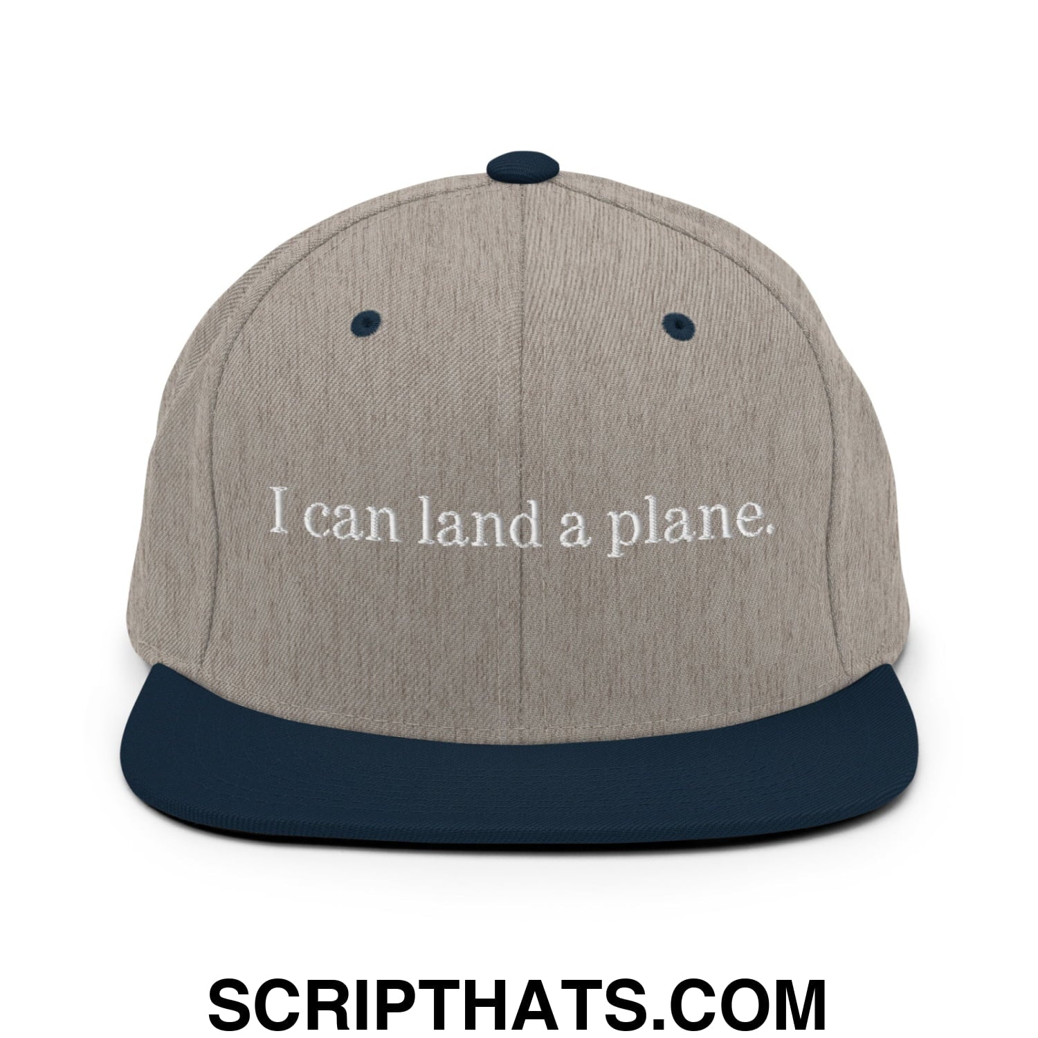 Beige and navy blue snapback cap with white embroidered i can land a plane text and flat bill brim design