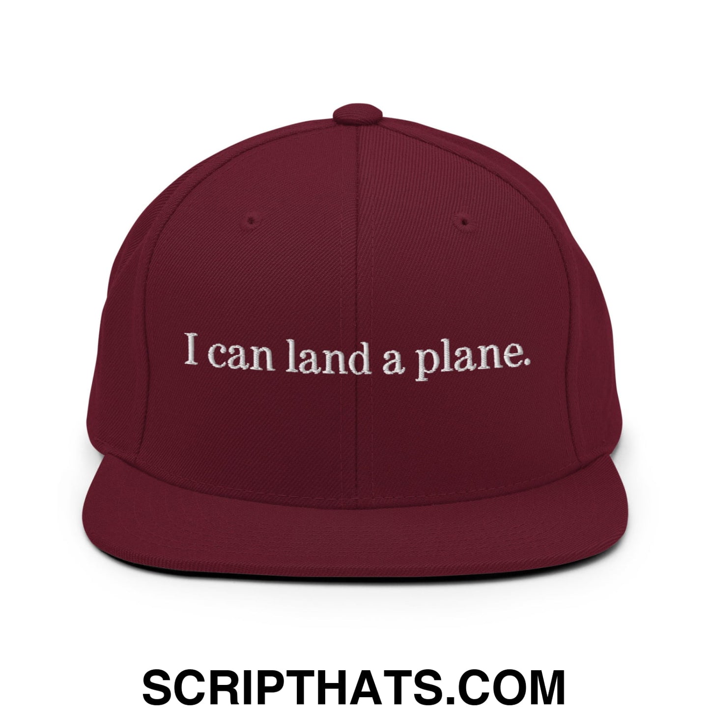 Maroon snapback hat with white embroidered text i can land a plane on a flat bill brim perfect for casual wear