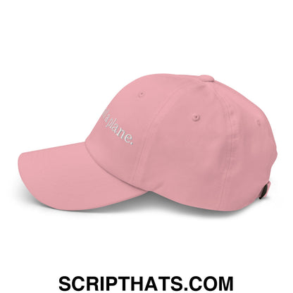 A soft pink unstructured dad hat with white embroidered text reading via a plane in i can land a plane design