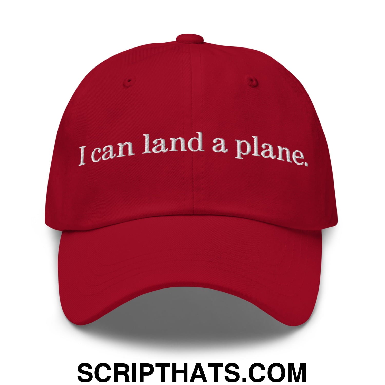 Red unstructured dad hat with white embroidered text i can land a plane perfect for casual wear