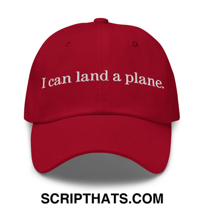 Red unstructured dad hat with white embroidered text i can land a plane perfect for casual wear
