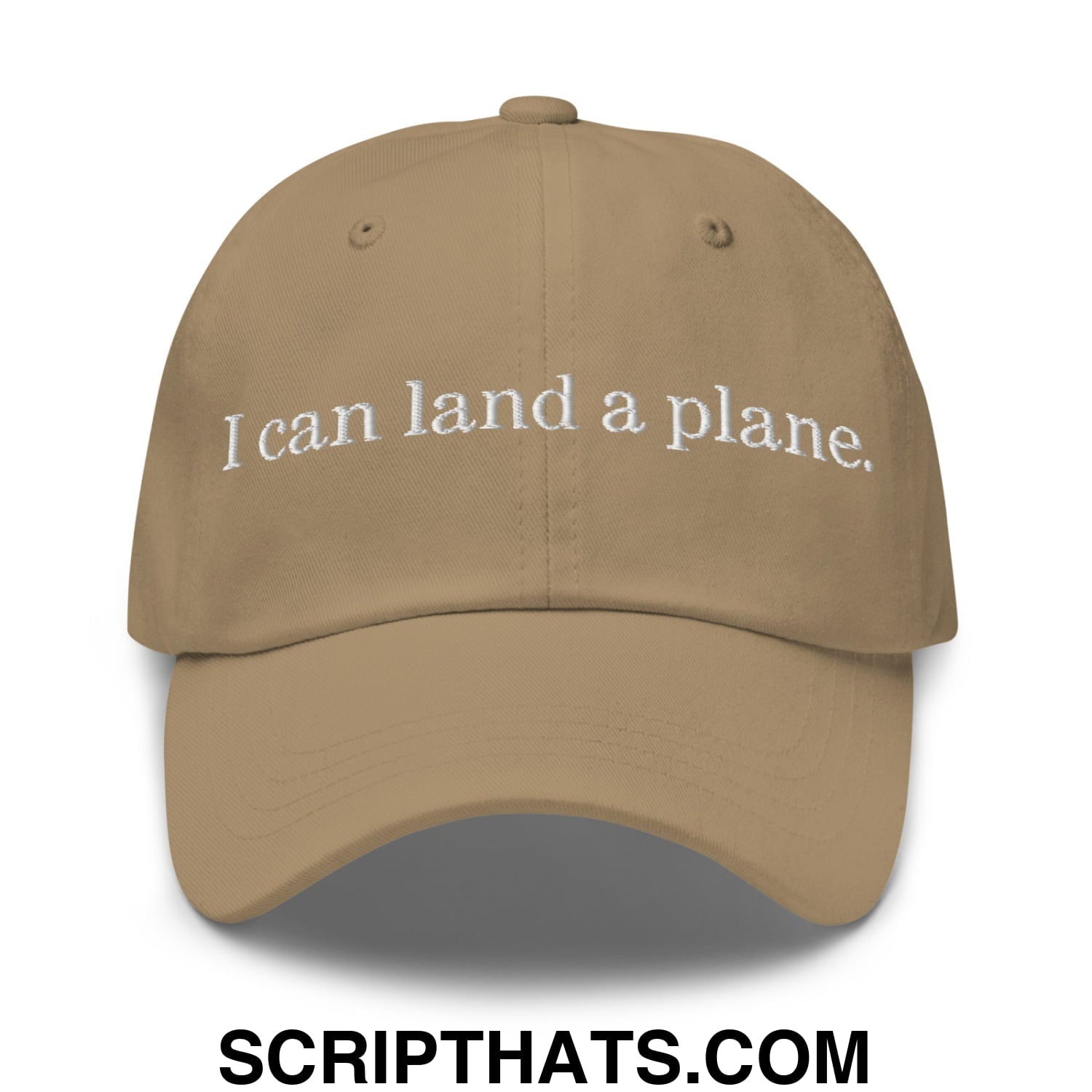 Tan unstructured dad hat with white embroidered text i can land a plane featuring a casual baseball cap design