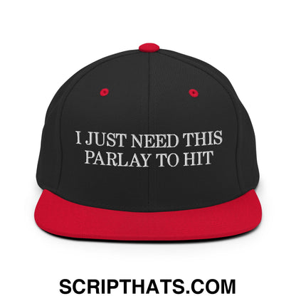 Black and red snapback hat with white embroidered i just need this parlay to hit text on flat bill brim