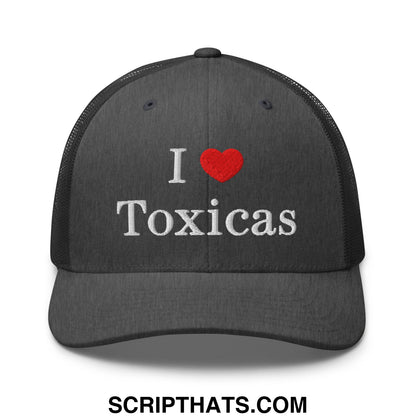 Black mesh trucker hat with white embroidered i heart toxicas text and red heart symbol perfect for casual wear
