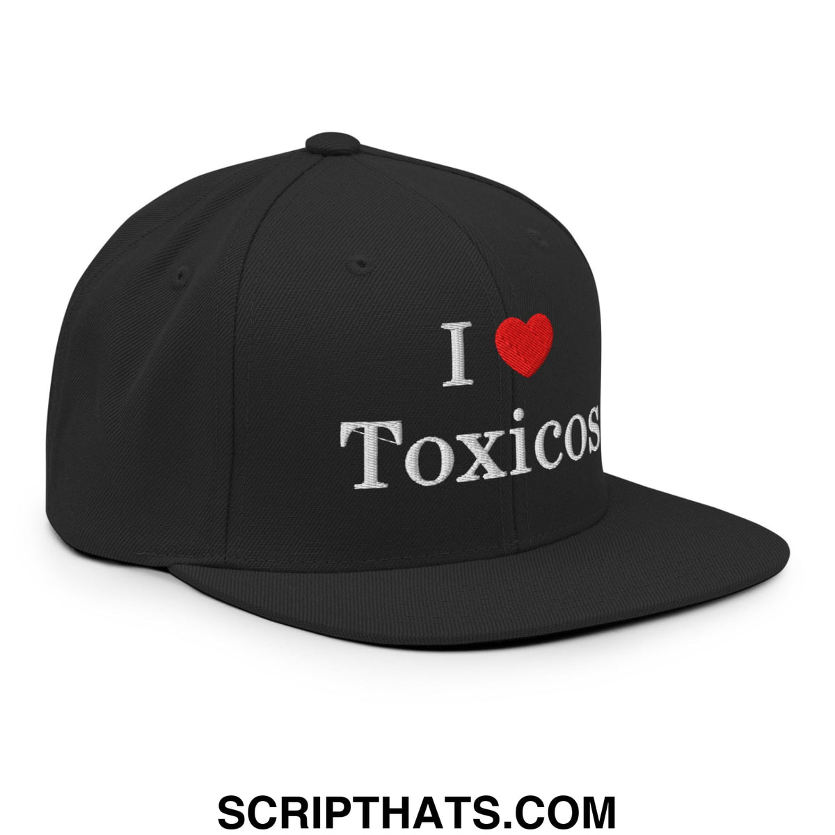 Black snapback cap with white embroidered i heart toxicos text and red heart symbol on flat bill brim