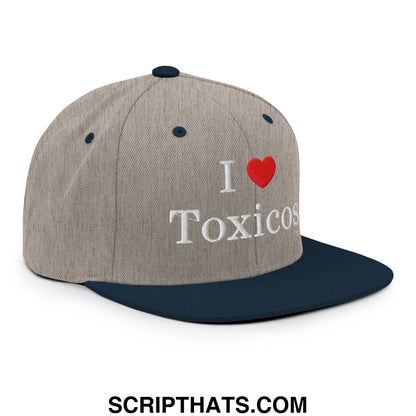 Gray and navy blue snapback hat with i love toxicos white embroidery and flat bill brim for casual wear