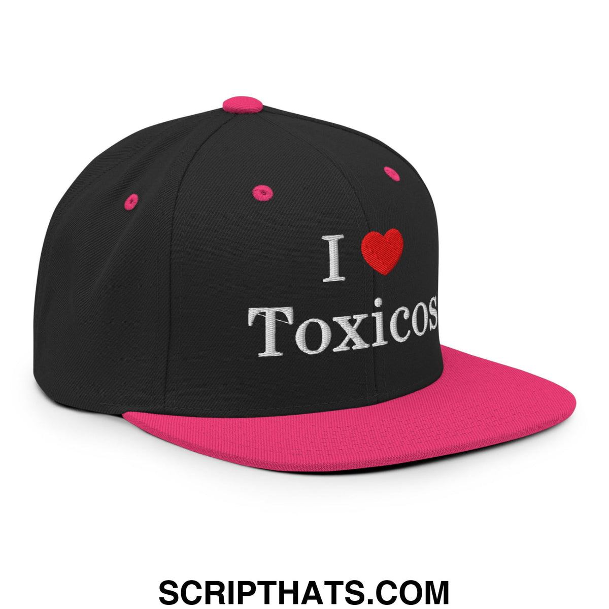 Black snapback hat with vibrant pink flat bill brim and embroidered white i heart toxicos text on front