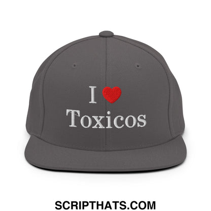 Gray snapback hat with white embroidered i love toxicos text and red heart on flat bill brim