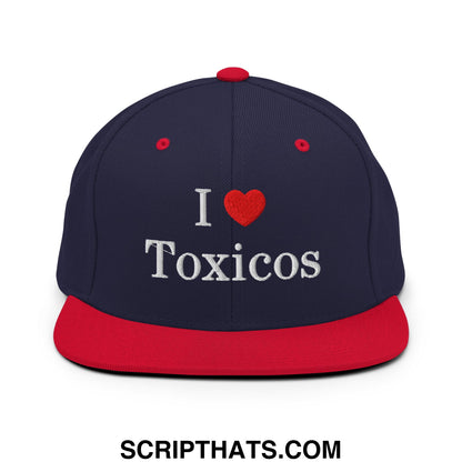 Navy blue and red snapback hat with white embroidered i love toxicos text and flat bill brim design