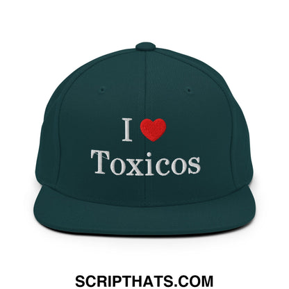 Dark green snapback cap with white embroidered i heart toxicos text and red heart flat bill brim design
