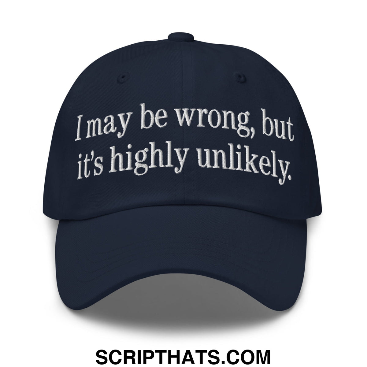 Dark navy unstructured dad hat with white embroidered text i may be wrong but it’s highly unlikely