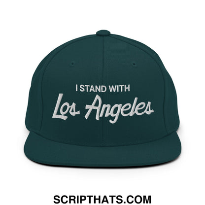 Dark green snapback cap with white embroidered i stand with los angeles text featuring a flat bill brim design