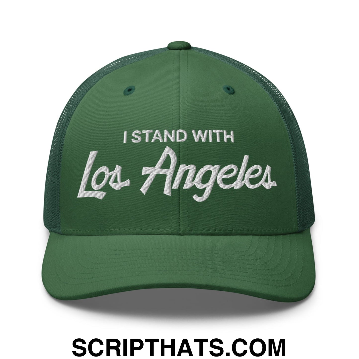 A dark green mesh trucker hat with white embroidered i stand with los angeles vintage sports script text
