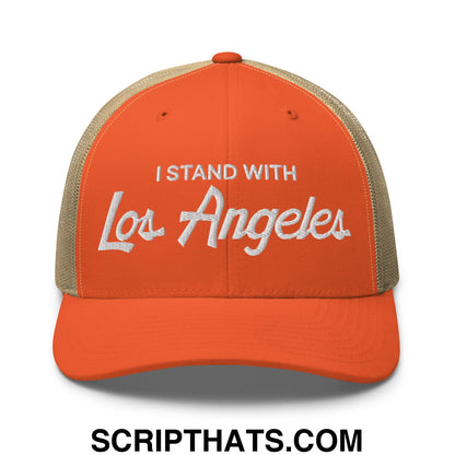 Orange and beige mesh trucker hat with white embroidered text i stand with los angeles in vintage sports script style