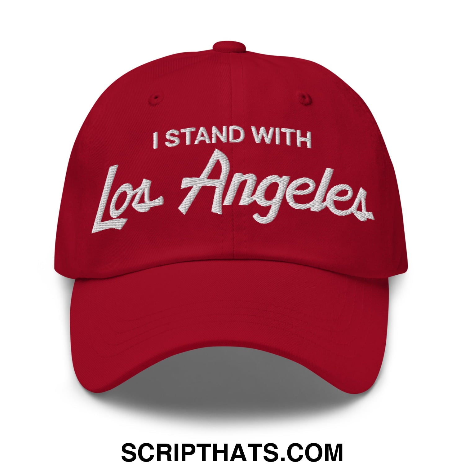 Red unstructured dad hat with white embroidered i stand with los angeles vintage sports script text