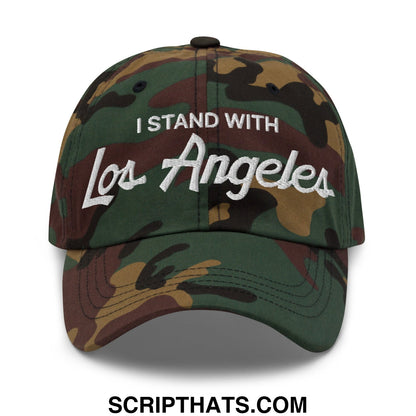 A camouflage unstructured dad hat with white embroidered i stand with los angeles text on the front
