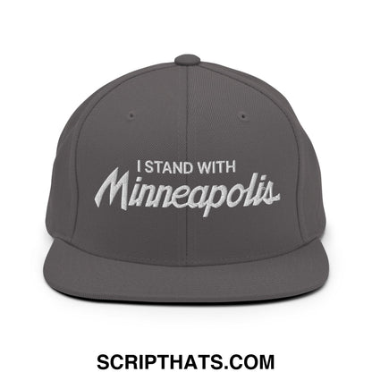 Gray snapback hat with white embroidered i stand with minneapolis script text and flat bill brim design