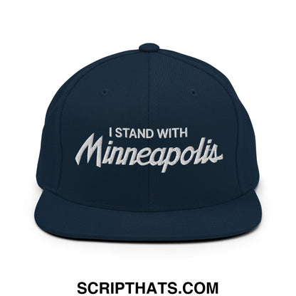 Navy blue snapback cap with white embroidered i stand with minneapolis text in script font flat bill brim hat