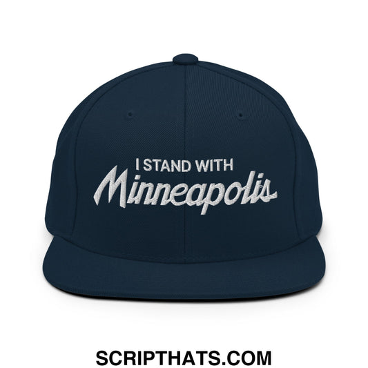 Navy blue snapback cap with white embroidered i stand with minneapolis text in script font flat bill brim hat
