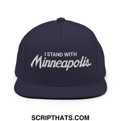 Navy blue snapback hat with white embroidered i stand with minneapolis text in script font flat bill brim
