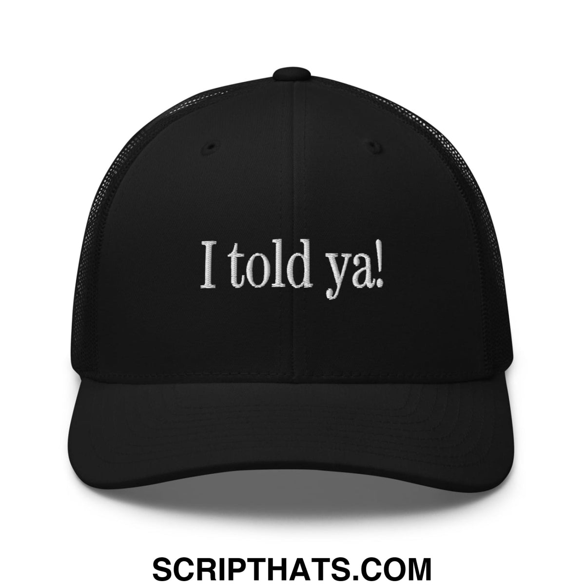 Black mesh trucker hat with white embroidered i told ya text on front for casual wear