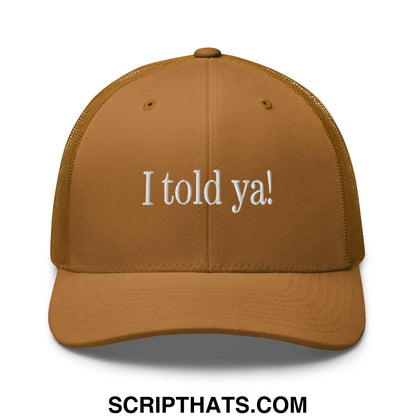 Tan mesh trucker hat with white embroidered text reading i told ya featuring breathable mesh panels