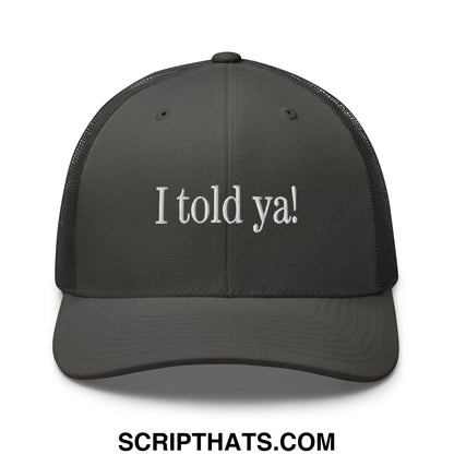 Dark gray embroidered mesh trucker hat with white i told ya text on the front in casual style