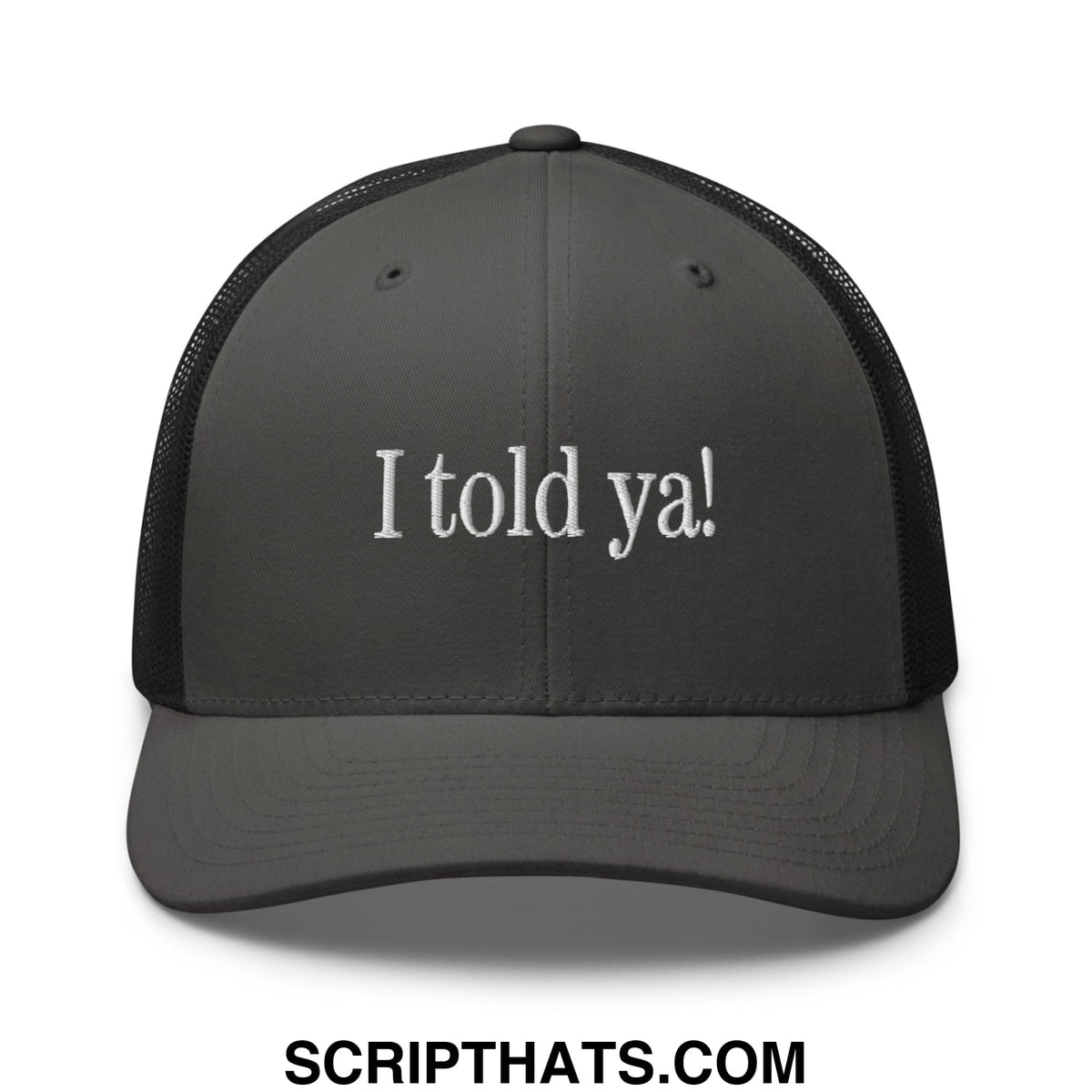 Dark gray mesh trucker hat with white embroidered i told ya text on the front for casual wear