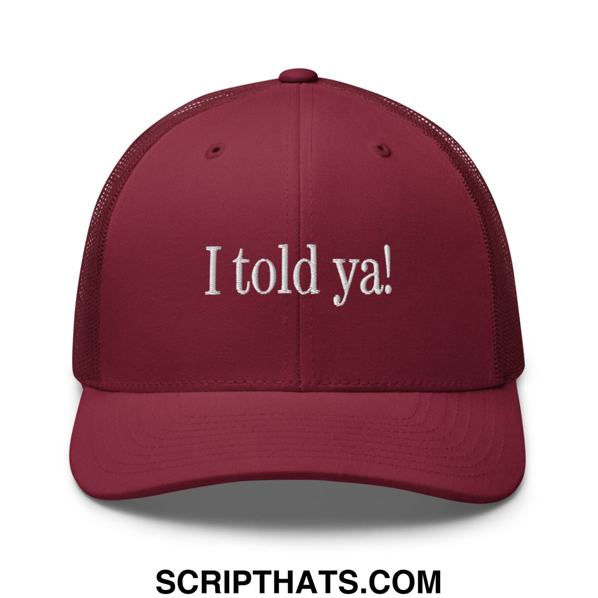Maroon mesh trucker hat with white embroidered i told ya text on front perfect for casual wear