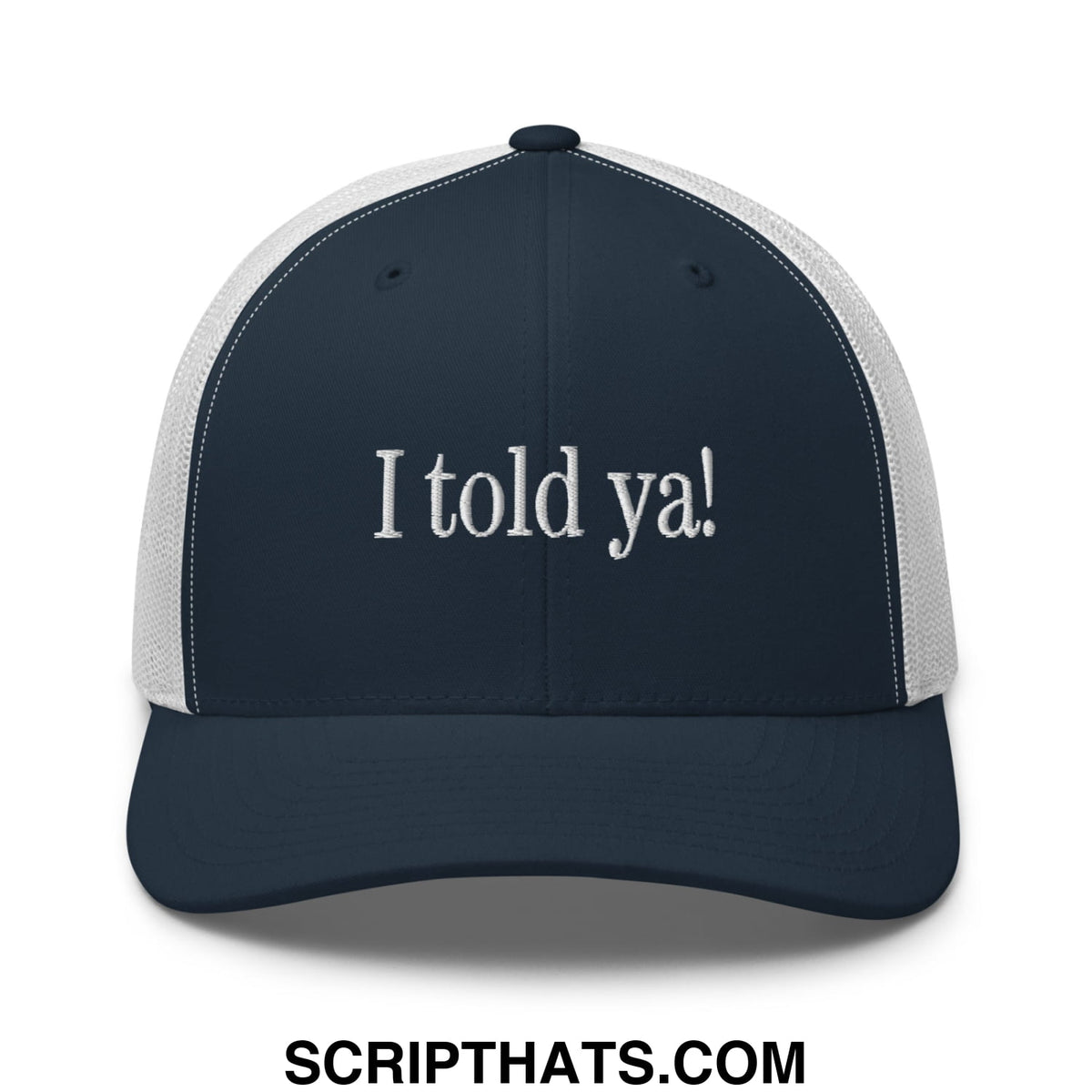 Navy blue and white mesh trucker hat with i told ya embroidered in white script on the front panel