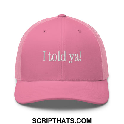 Pink mesh trucker hat with white embroidered i told ya text featuring breathable mesh panels