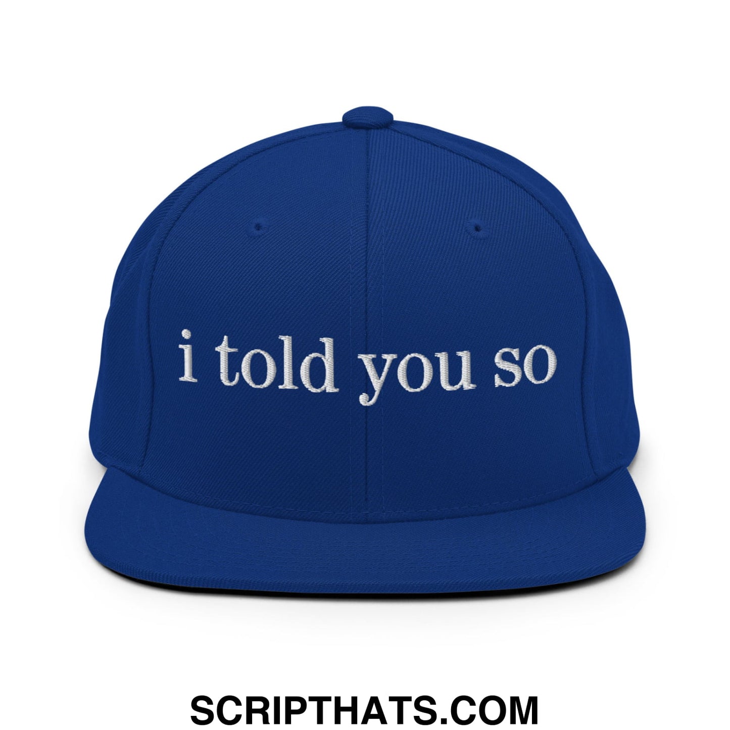 Royal blue snapback cap with white embroidered i told you so text and a flat bill brim for casual wear