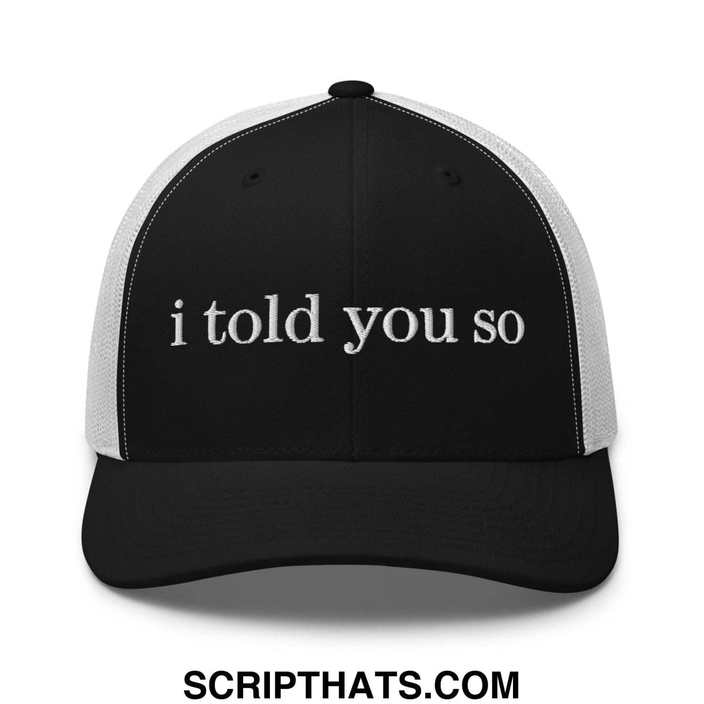 Black and white mesh trucker hat with i told you so embroidered in white script on the front panel