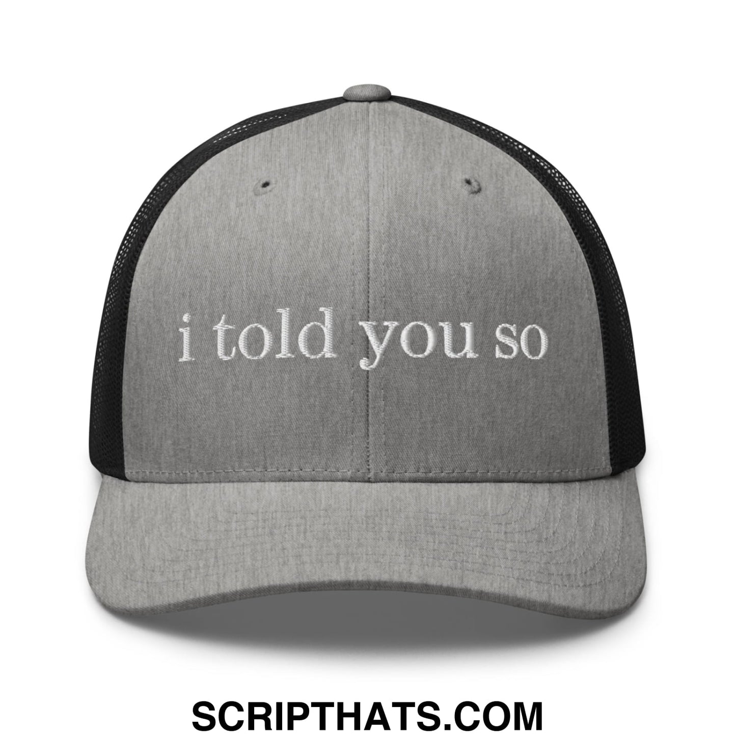 Gray mesh trucker hat with black back and white embroidered text i told you so in a casual style