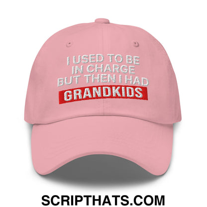 Pink unstructured dad hat with embroidered text i used to be in charge but then i had grandkids in white and red thread
