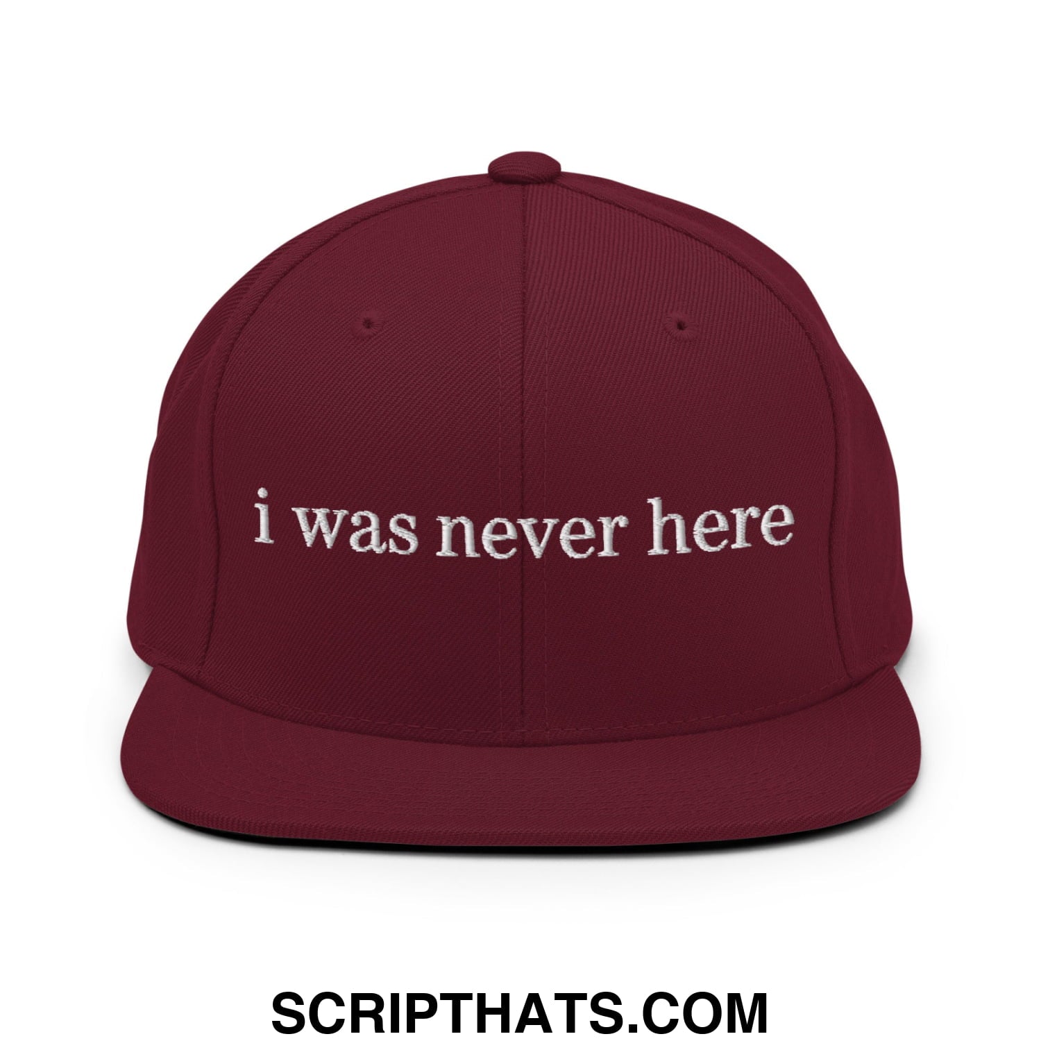 Maroon flat bill brim snapback hat with white embroidered i was never here text in a casual style